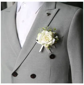 Elegant white rose boutonniere for wedding grooms, business meetings and formal party events.