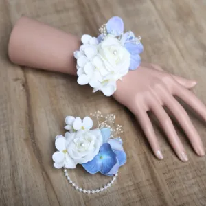 Wedding artificial flower wrist corsage set with blue white roses and pearls for bride bridesmaid.