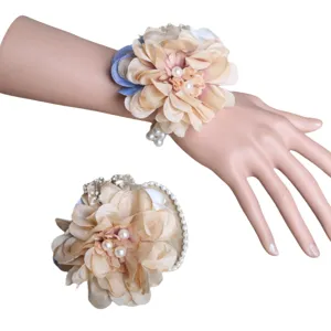 Elegant artificial flower wrist corsage for weddings, bridesmaids, and bridal parties.