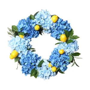 Corona de hortensias azules artificiales con limones amarillos decoracion de pared