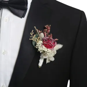 Elegant wedding boutonniere for men suit, dried flower rose corsage for party ceremony.
