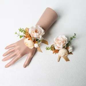 Champagne artificial rose wrist flower and matching corsage set for wedding bride.