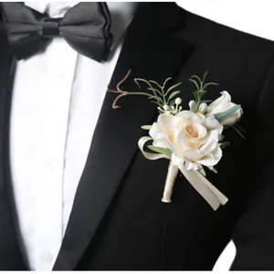 Elegant white rose wedding boutonniere for groom and groomsmen, perfect floral accessory.