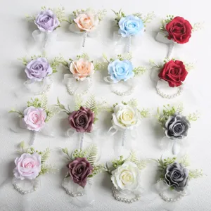 Artificial rose wrist corsage and boutonniere set for wedding and graduation prom.