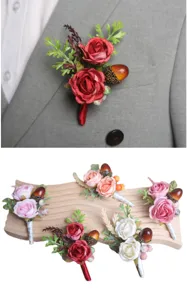Detailed view of artificial rose flower boutonnieres with pinecones for weddings and parties.