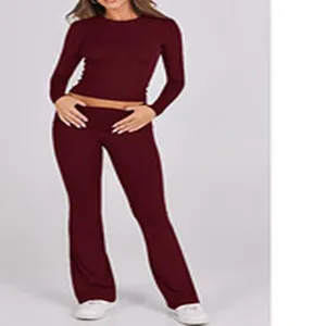 Dames effen kleur lange mouw crop top en uitlopende broek tweedelig casual set