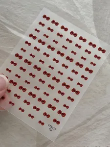 Pegatinas de uñas con lazo rojo 3D detalle, acabado de gel brillante bonitas mini pegatinas minimalistas.