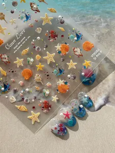 Summer embossed starfish seashell nail art stickers detailed view of ocean theme.