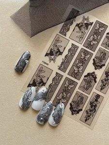 Lace butterfly nail stickers with 3D relief hollow mesh patterns for elegant French manicure.