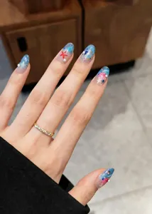 Ocean series embossed nail stickers featuring seashell and starfish patterns with a delicate ring.