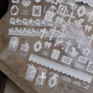 White embossed lace cross nail stickers, vintage French English frame bow DIY nail art detail view