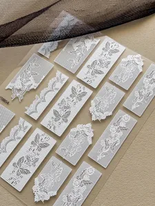 3D embossed white lace butterfly nail art stickers, delicate hollow mesh floral strips.