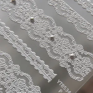 White lace relief nail stickers with pearl design, main product view showing exquisite details.