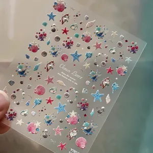Ocean theme 5D embossed nail stickers featuring starfish, seashells, and pearls for summer art.