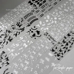 Nail art transfer paper sticker set featuring bowknot, flower and lace designs for DIY manicures.