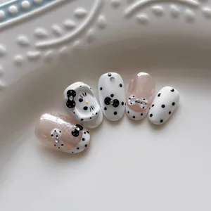 Lindo juego de uñas postizas con lazo de lunares brillante dulce consejo de arte de uñas