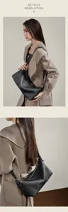 Black genuine leather hobo shoulder bag for women, stylish vintage baguette crossbody purse.