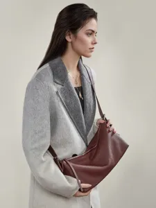 Women's genuine leather slouchy shoulder bag stylish underarm hobo baguette handbag for daily wear.