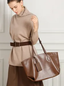 Premium genuine leather tote bag for women, large capacity stylish commuting shoulder bag.