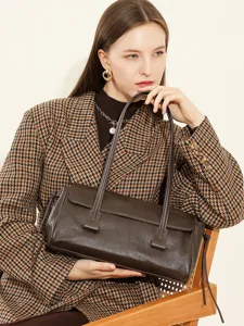 Brown leather underarm bag for women, stylish vintage baguette shoulder handbag for autumn winter.
