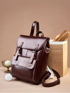 Vintage donkerbruine lederen rugzak voor dames, grote capaciteit casual college stijl.