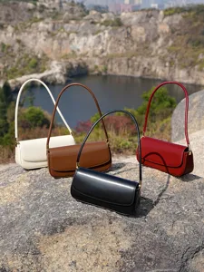 Echt lederen schoudertas okseltas minimalistisch ontwerp elegante dames handtas voor dagelijks.