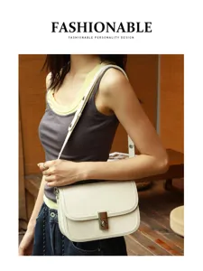 Minimalist leather shoulder bag for women, retro crossbody underarm bag with metal lock design.