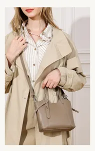 Stylish leather bucket bag for women, versatile crossbody tote with top handle. Perfect everyday.