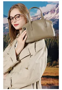 Klassieke lederen Boston handtas voor dames, elegante schoudertas detail weergave.