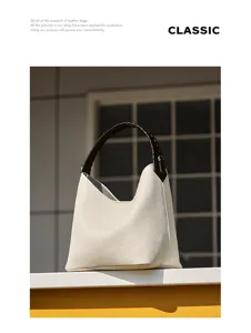 Borsa hobo classica in vera pelle con manico intrecciato, elegante borsa a spalla in pelle.