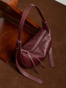 Genuine leather crescent shoulder bag for women, soft solid color commuter dumpling crossbody.