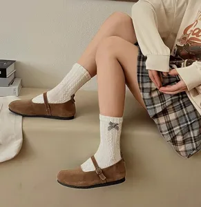 Korean style sweet college mid-calf socks with cute bow details and vintage casual shoes.