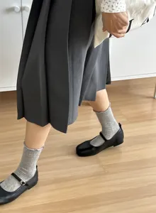 Summer sweet style women ruffles crew socks paired with black Mary Jane shoes and skirt.