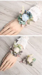 Detailed view of European wedding artificial rose wrist corsage and boutonniere for bridal party.