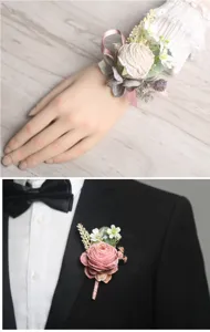Wedding artificial flower wrist corsage and boutonniere detail for groom and bride celebration.