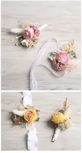 European wedding rose simulation corsage and wrist flower set for bride and groom details.