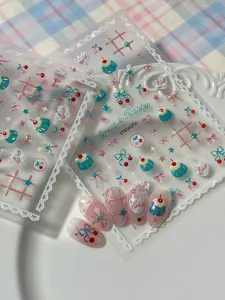 Cute cherry pudding nail stickers with sweet lace bow designs, perfect for summer manicure art.