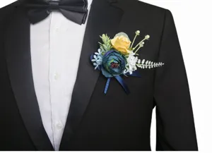 Detailed close-up of blue and yellow artificial rose boutonniere lapel flower for wedding suit.