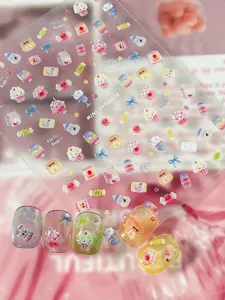 Detailed view of 3D mini dessert nail stickers with cute candy and cake designs for art.