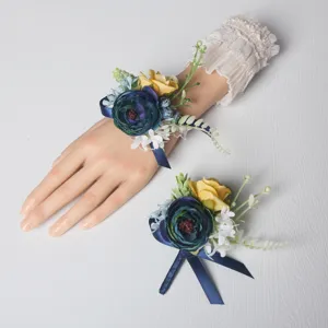Elegant navy and yellow artificial flower wrist corsage and matching wedding boutonniere set.