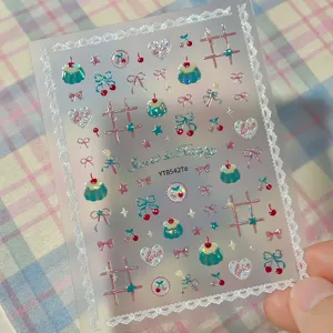 Cute 3D cherry dessert nail art stickers with lace and bows for summer manicure decor.