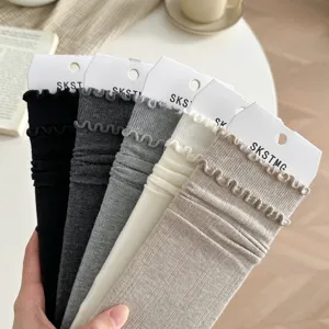 Cozy cotton mid-calf stacking socks with sweet double lettuce edge design, five versatile colors.