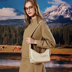 Genuine leather hobo bag for women, casual commuter crossbody shoulder dumpling bag, stylish.