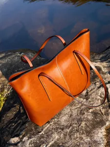 Grote bruine lederen shopper tas voor dames stijlvolle schoudertas handtas hoofdaanzicht