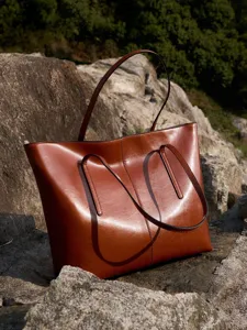 Stijlvolle bruine echt lederen shopper tas voor dames, grote capaciteit schoudertas en handtas.