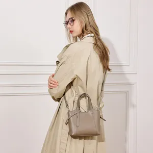 Minimalist genuine leather bucket tote bag for women, stylish casual crossbody handbag.