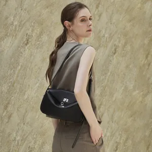 Classic black leather shoulder bag for women, stylish messenger bag with metal lock closure.