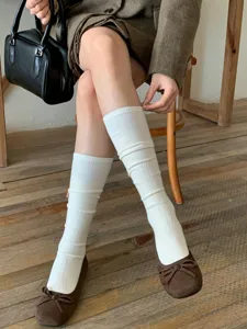 Women's wool slouch socks, cozy white ribbed long tube socks for autumn and winter daily wear detail.