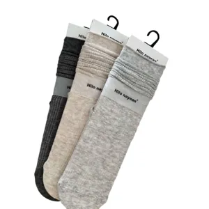 Cotton vertical stripe slouch socks for women, retro mid-tube design, comfortable casual wear.