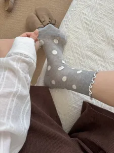 Women's sheer polka dot summer mesh mid-tube socks with cute breathable ruffle lace trim.